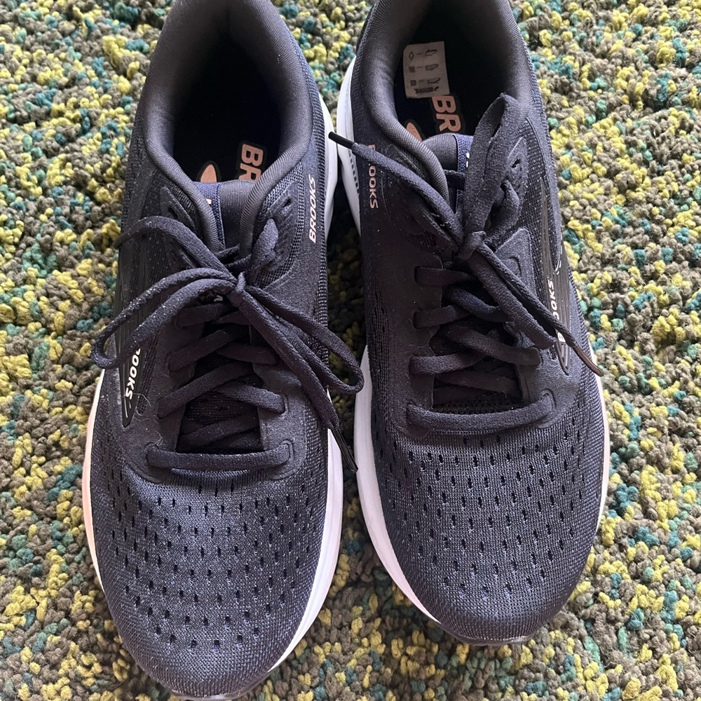 Brooks Women’s Black and White Running Shoe with Subtle Peach Accent